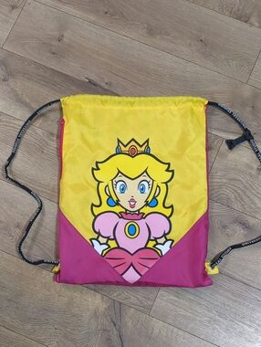 UNIVERSAL STUDIOS SUPER NINTENDO WORLD PRINCESS PEACH DRAWSTRING BACKPACK